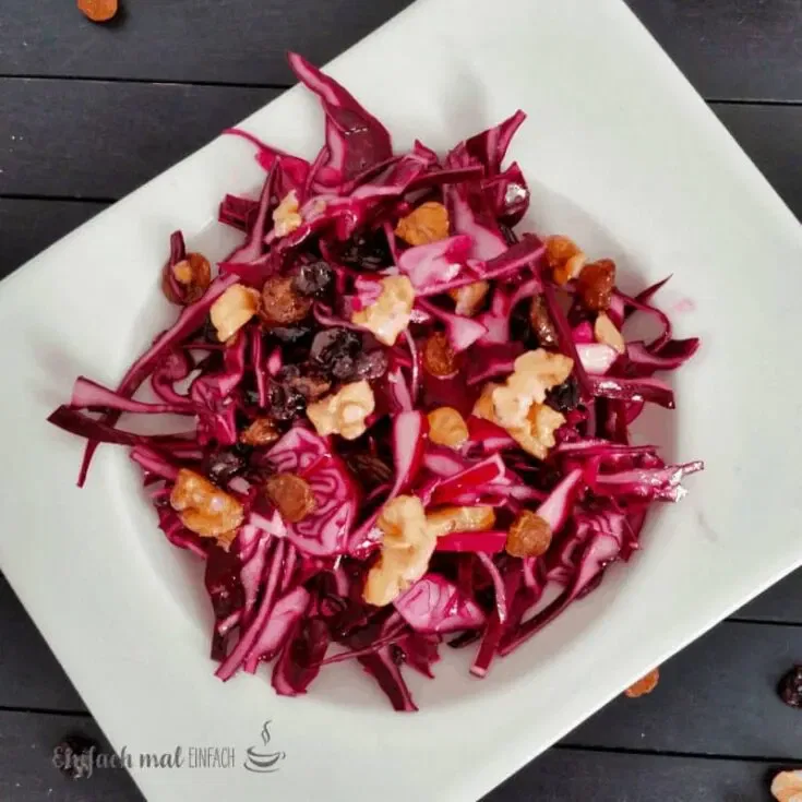 Red cabbage slaw with walnuts and raisins