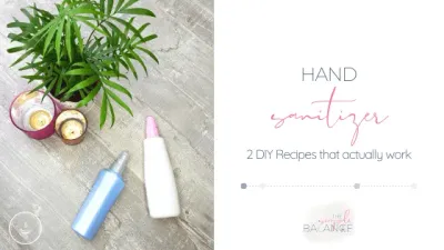 DIY hand sanitizer bottles on grey surface