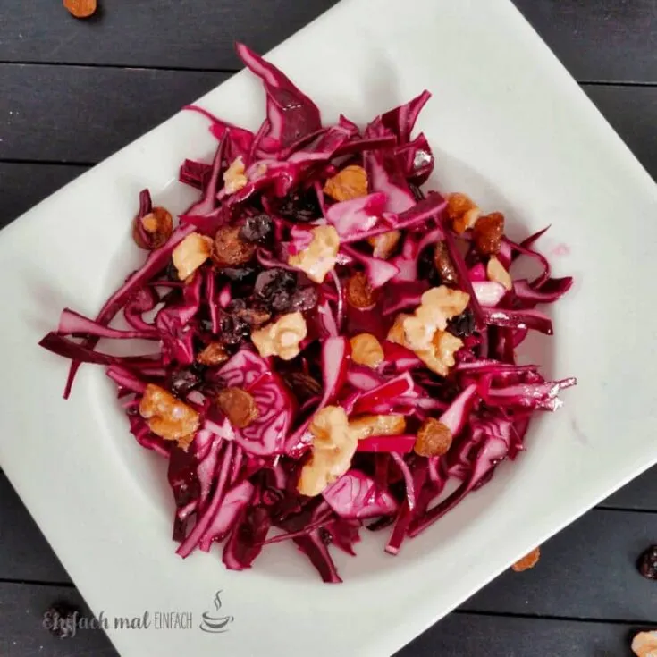 Red cabbage slaw with walnuts and raisins