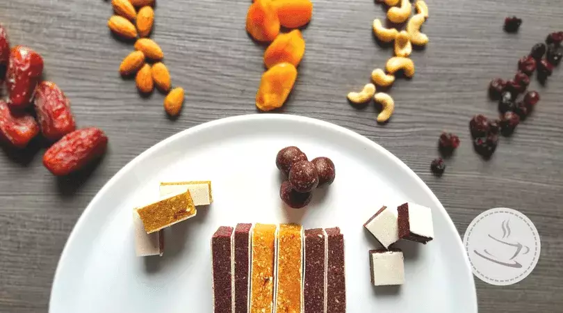 Homemade fruit bars - 1 recipe and 3 variations 2 fruit bars and ingredients on and next to a plate