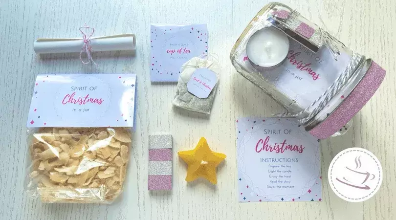 DIY gift idea: 15 Minutes of Christmas in a jar 3 Spirit of Christmas in a jar elements laid out on a board