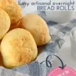 Freshly baked artisanal bread rolls with coffee, perfect for a cozy breakfast experience.